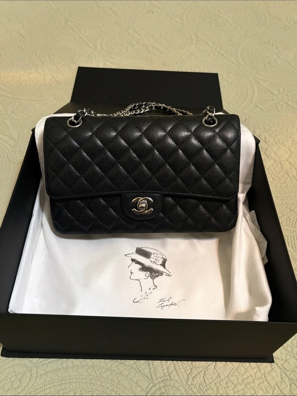 CHANEL Black Quilted Flap Shoulder Bag with Silver Hardware